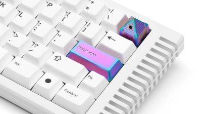 You can now buy a limited edition 'F*** off' keycap for $40 and a pyramid shaped escape key that stabs you if that's your idea of fun - pcgamer.com