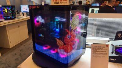 MSI stuck a transparent LED crystal film screen in its new fishbowl case and it looks genuinely impressive in action - pcgamer.com