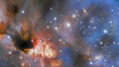 NASA’s Hubble Space Telescope image reveals massive star birth in celestial tapestry - tech.hindustantimes.com